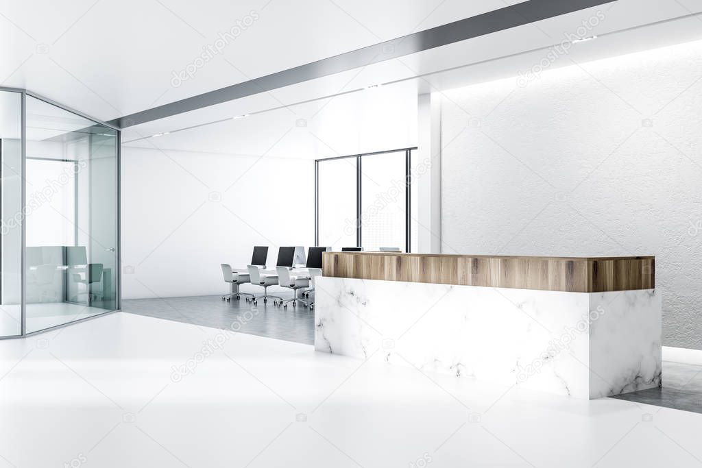 Minimalistic office interior with white walls, concrete floor with rows of massive white tables with black computer screens and panoramic windows. Marble and wooden reception counter. 3d rendering