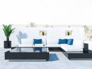 Siyah ve beyaz koltuklar, mavi minderler ve siyah sehpa ile bir lüks ev balkon. Yakın çekim. Arka plan tropikal görünümünde. 3D render