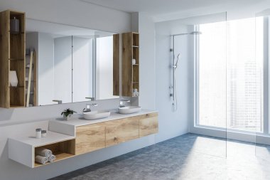 Modern banyo köşesinde beyaz duvarlar, beton zemin, çift lavabo ahşap tezgah ve büyük ayna üzerinde duruyor. Cam kapı duş. 3D render