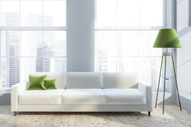 Lüks salon iç Gri duvarlar, ahşap zemin, yeşil yastıkları ile beyaz kanepe ve bir zemin lamba. 3D render