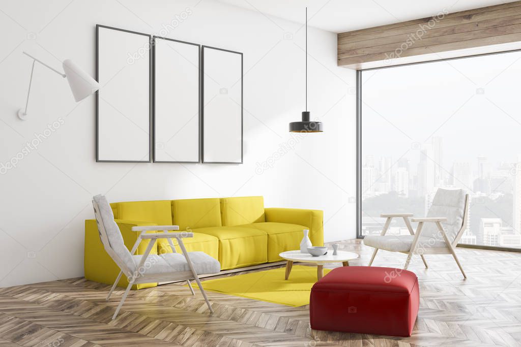 White living room interior with wooden floor, yellow sofa, white and red armchairs, and a coffee table with row of vertical mock up poster frames. 3d rendering