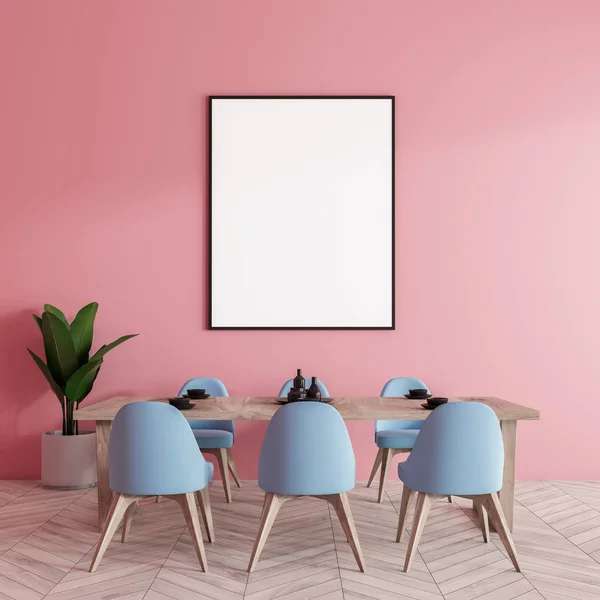 Long dining room table with gray chairs standing in a pink room with wooden floor and vertical mock up poster. 3d rendering