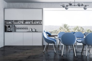 Beyaz duvarları, ahşap zemin, tropik manzaralı panoramik pencerelere ve mavi sandalye ile siyah tablo ile modern yemek odası iç. Köşedeki dolapta. 3D render