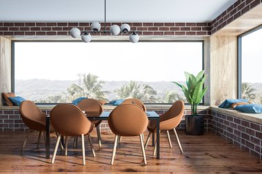 Tuğla duvarlar, ahşap zemin, tropik manzaralı panoramik pencerelere ve kahverengi sandalye ile siyah tablo ile şık yemek odası iç. 3D render