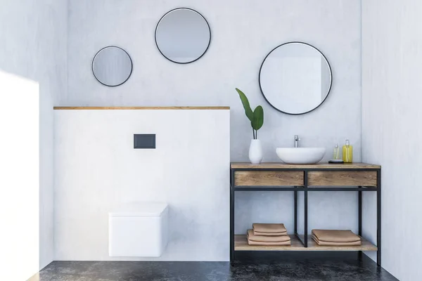 白い壁 黒い床と白い便器の横に丸い鏡が付いている白流しと高級バスルーム インテリア レンダリング — ストック写真