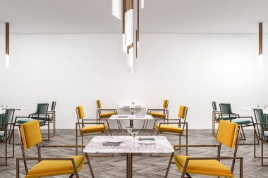 Beyaz duvarları, ahşap zemin, sarı ve yeşil sandalyeleri yakınındaki kare tablolar ile Restoran iç. 3D render
