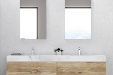 Banyo çift lavabo yapılmış ahşap tezgah mermer ayakta üstünde beyaz duvar odasında asılı iki dikey aynalar ile kapatın. 3D render