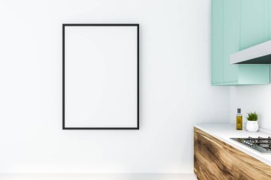 Dikey beyaz ve ahşap mutfak tezgahı ve mavi dolapları ile beyaz mutfak duvarda asılı poster çerçevesi kadar sahte. 3D render