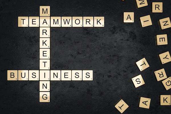 Words Business Teamwork Marketing Spelled Gold Scrabble Tiles Lying Black — Stock Photo, Image