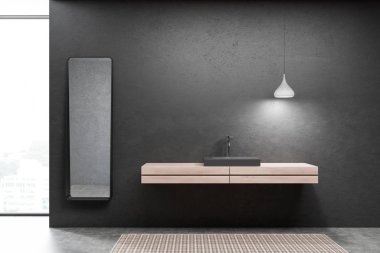 Siyah duvarlar, beton zemin, ahşap tezgah ve dar dikey ayna üzerinde duran siyah lavabo banyo iç. 3D render