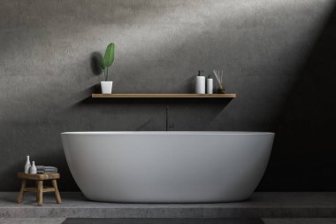 Minimalist banyo iç Gri duvarlar, beton zemin, beyaz küvet şampuan ve krem üstündeki rafta. 3D render