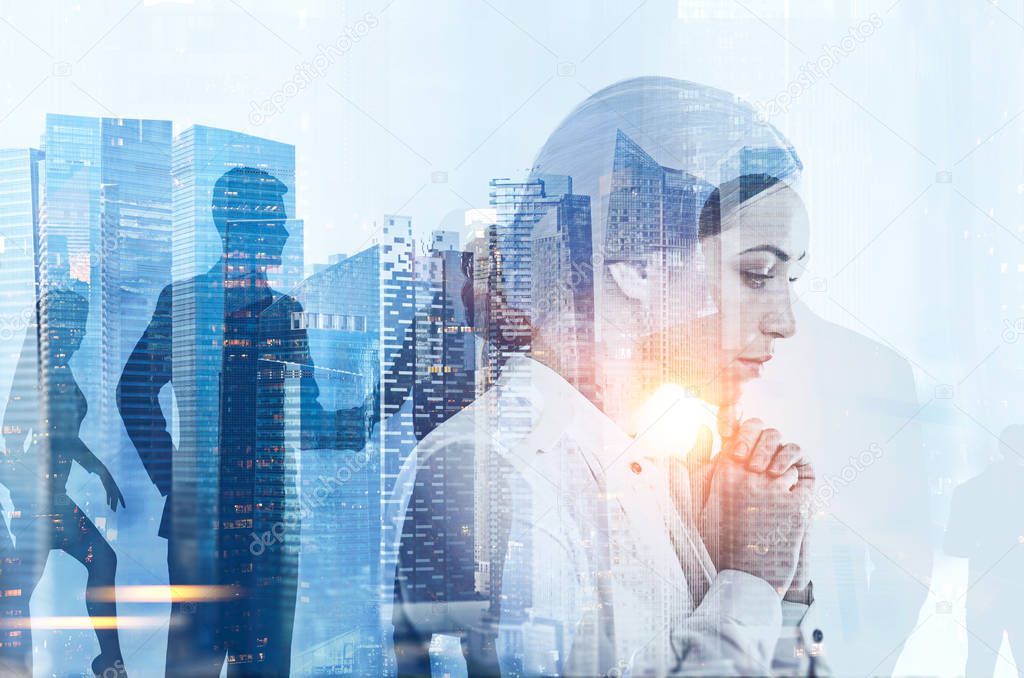 Portrait of pensive young businesswoman over modern cityscape background with business people silhouettes. Concept of decision making. Toned image double exposure