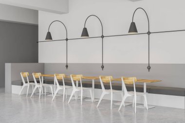 Gri ve beyaz duvarlar, beton zemin, beyaz ve ahşap sandalye ve ahşap masa ve özgün duvar lambaları yakın gri kanepeler ile modern kafe köşesinde. 3D render