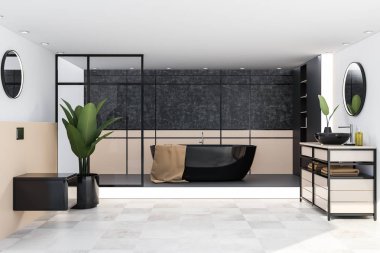 Lüks banyo bej duvarlar, kiremitli kat, siyah küvet, lavabo bej tezgah üzerinde duran ve bir tuvalet kahverengi havlu ile iç. 3D render