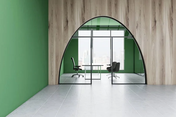 Manager office with green and wooden walls, tiled floor, large window, computer desk with laptop, manager chair and two visitors chairs as seen through arched door in the lobby. 3d rendering