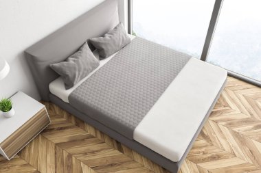 Üstten görünüm beyaz duvarlar, ahşap zemin, panoramik pencere, gri yatak yatak odası iç ve beyaz ve ahşap komodinde. 3D render