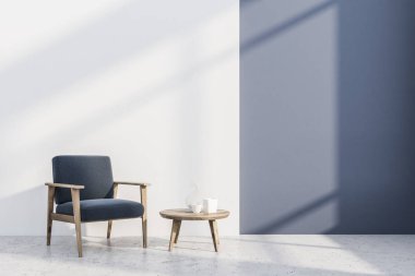 Minimalist oturma odası mavi ve beyaz duvarlar, beton zemin ve gri ile iç ve ahşap yuvarlak sehpa yakınındaki koltuk ayakta. 3D render alay