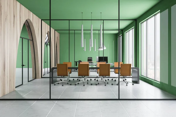 Interior of office meeting room with green, glass and wooden walls, tiled floor and gray table with brown chairs. 3d rendering