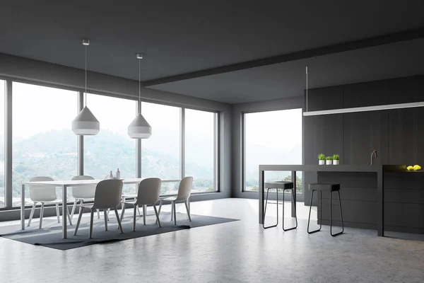 Corner of modern kitchen with gray and wooden walls, concrete floor, gray island and bar with stools and white table with chairs. 3d rendering