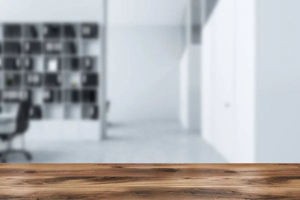 Interior of modern office with white walls, concrete floor, white table with chair and bookcase with folders. White office doors to the right. 3d rendering blurred