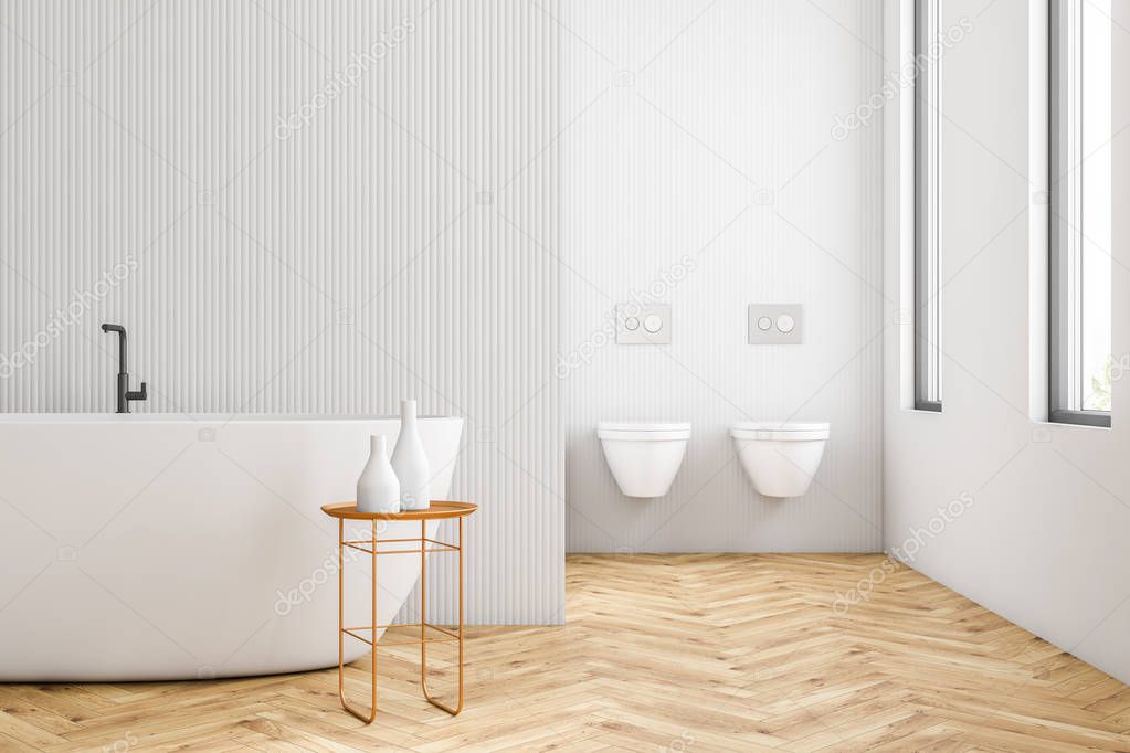 Interior of modern bathroom with white walls, wooden floor, loft windows, white bathtub and two toilets. 3d rendering