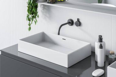 Üstten görünüm beyaz duvarları ve bir ayna ile odada gri tezgah üzerinde duran dikdörtgen beyaz banyo lavabo. 3D render