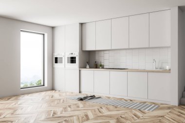 Beyaz duvarları, ahşap zemin, çatı penceresi ile şık mutfak ve beyaz ve ahşap mutfak tezgahı köşesinde. İki fırın. 3D render