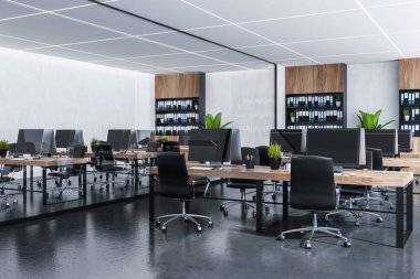 Açık alan office beyaz duvarlar, gri döşeme, ahşap bilgisayar tabloları siyah sandalye ve klasörlerle ahşap kitaplıklar ile satırları ile iç. 3D render