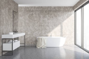 Beton duvarlar ve zemin, çatı penceresi, beyaz küvet ve beyaz Lavabonun üstündeki dikey ayna ile modern banyo iç. 3D render