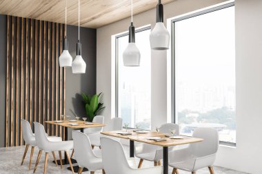 Gri ve beyaz duvarlar, beton zemin, çatı windows ve beyaz sandalye ile ahşap masa ile modern kafe köşesinde. 3D render