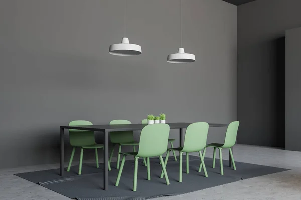 灰色の壁 コンクリートの床とカーペットの上に立って緑の椅子と灰色のテーブルとミニマリズムのダイニング ルームのインテリア レンダリング — ストック写真