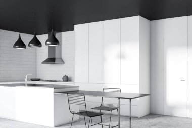 Beyaz tuğla duvar, beton zemin, siyah tavan, beyaz mutfak tezgahı ve dolapları, gri ve beyaz Adası ve siyah masa sandalye ile modern mutfak köşesinde. 3D render