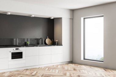 Gri ve siyah mermer duvarlar, ahşap zemin ve yerleşik Ocak ve lavabo ile beyaz mutfak tezgahı ile minimalist çatı katı mutfak iç. 3D render