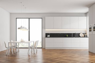 İç beyaz duvarlar, ahşap zemin, beyaz mutfak tezgahı ve dolapları ile modern mutfak ve beyaz yemek masası sandalye ile. 3D render