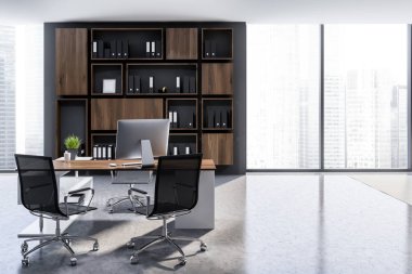 Ceo office Gri duvarlar, panoramik pencerelere, beton zemin ile iç ve beyaz ve ahşap tablo bilgisayar ve siyah sandalye ile. Koyu ahşap kitaplık ile ağıl. 3D render