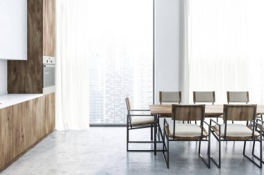 Beyaz duvarları, taş zemine, beyaz dolapları ve ahşap mutfak tezgahı ile modern mutfak ve uzun ahşap masa sandalye ile yan görünüm. 3D render