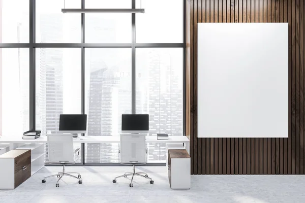 Modern office workplace with tiled floor, panoramic windows, white and wooden computer tables and vertical poster on wooden wall. 3d rendering mock up