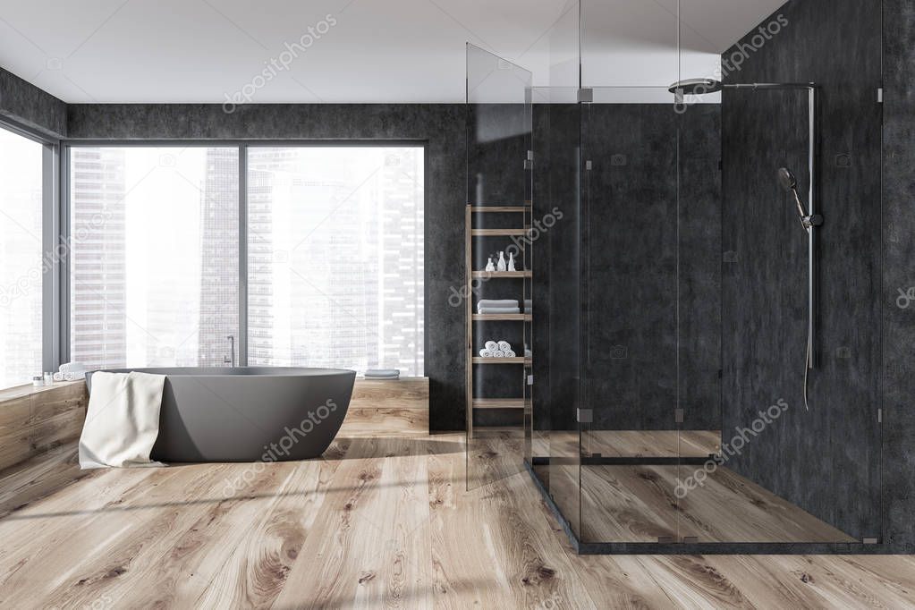 Interior of panoramic bathroom with gray walls, wooden floor, gray bathtub with a towel on it and shower with glass walls. 3d rendering