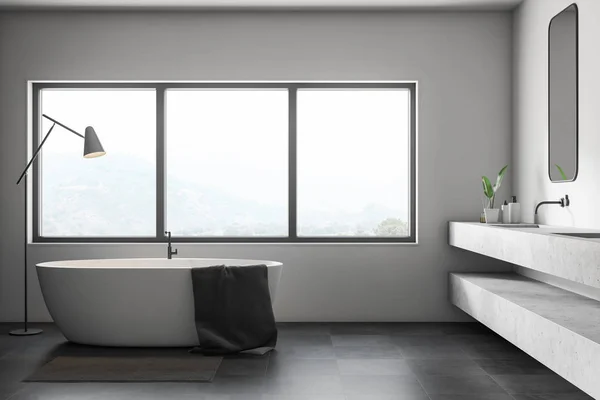 ovale baignoire dans salle de bains avec moderne gris des murs, les plantes  sur marbre sol dans lumière du soleil de fenêtre pour luxe intérieur  Contexte. ai généré 23463743 Photo de stock