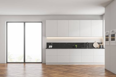 İç beyaz duvarlar, ahşap zemin, beyaz dolapları modern mutfak, mutfak tezgahı ile lavabo ve duvardaki iki fırın inşa. 3D render