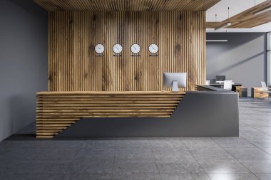 Modern ofis saatleri ve açık plan office arka plan gri ve ahşap duvarları ile gri ve ahşap resepsiyon masası ayakta. 3D render