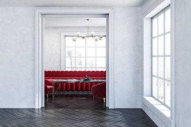 Boş beyaz oda iç kanepe kırmızı ve siyah mermer masa geniş kapıdan görülme yakınındaki ayakta koltuklar. 3D render