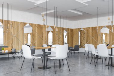 Restoran ahşap geometrik desen duvar, gri kanepe ve koltuklar siyah kahve masa yakınındaki ve kare tablolar yakınındaki beyaz sandalyeler köşesinde. 3D render
