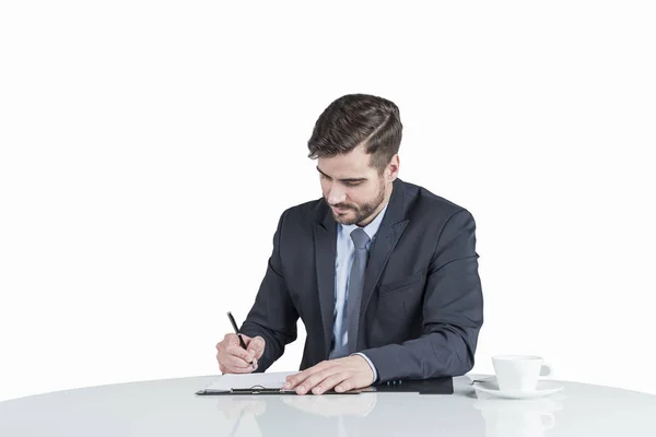 Isolated Portrait Bearded Businessman Sitting Table Cup Coffee Clipboard Writing — Stock Photo, Image