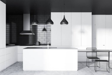 Interior of modern kitchen with black brick walls, concrete floor, white cupboards and countertops, white and gray island with sink and black table with chairs. 3d rendering