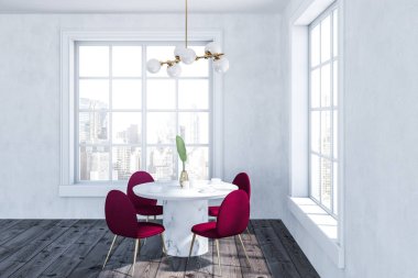 Modern dining room interior with white walls, wooden floor, round white table with red and gold chairs standing around it and two large windows. 3d rendering