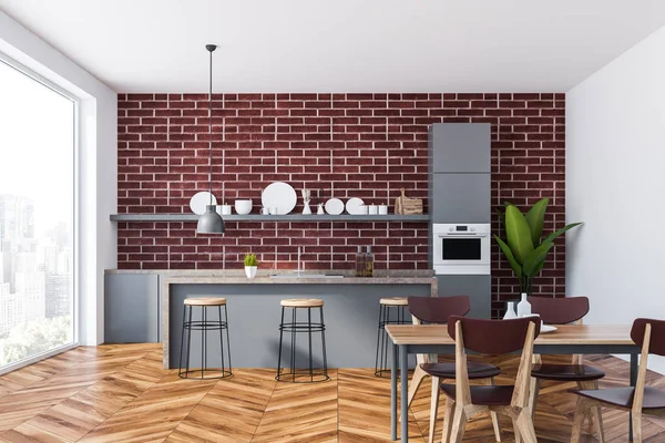 Interior of kitchen with brick walls, wooden floor, panoramic window, gray and marble countertops and bar with stools. Wooden table with chairs. 3d rendering