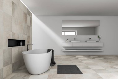 Şık banyo ve çift lavabo üzerinde asılı gri havlu ile beyaz ve bej döşeme duvarlar, beyaz küvetli yan görünüm. 3D render