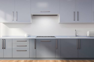 Minimalist mutfak iç beyaz duvarlar, ahşap zemin ile koyu gri mutfak tezgahı ile Ocak ve lavabo ve ışık gri dolabı inşa. 3D render