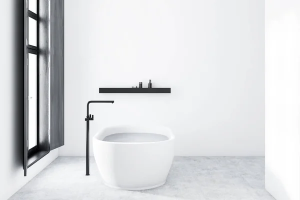 Interior of minimalistic bathroom with white walls, concrete floor, white bathtub standing near window and black shelf with creams. 3d rendering